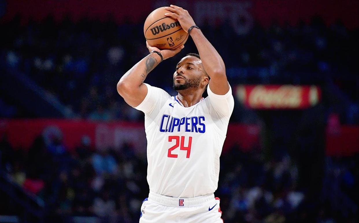 爱游戏亚洲官网-快船客场大胜雄鹿，继续保持不败